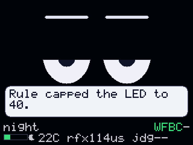 Sleepy half-lidded eyes, a moon beside an empty lux bar, bubble reading Rule capped the LED to 40.